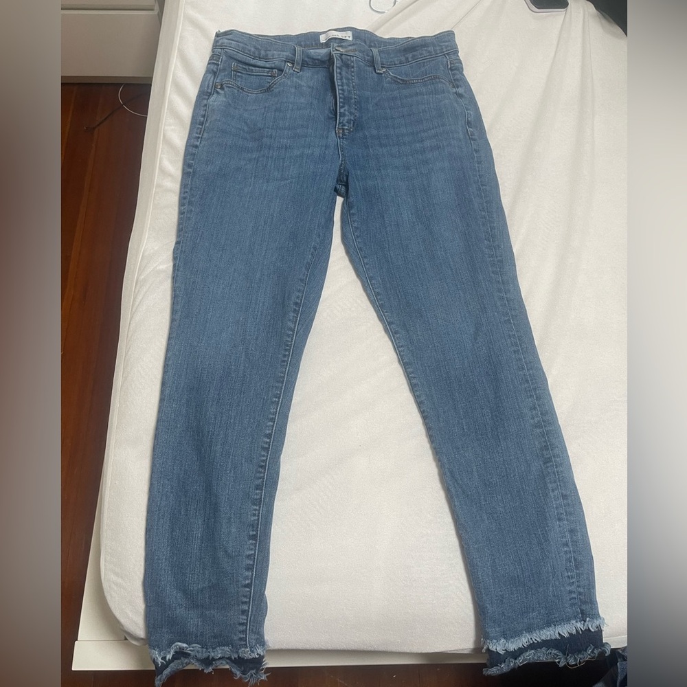 Ruffle hem skinny jeans